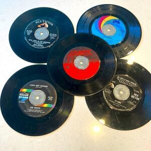 Webcor Inc. 45 adapters selling for the five adapters records included. 5 total